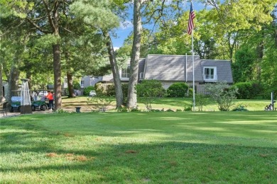 Discover this welcoming condo in the desirable Fairways Complex on Woodland Greens Golf Club in Rhode Island - for sale on GolfHomes.com, golf home, golf lot