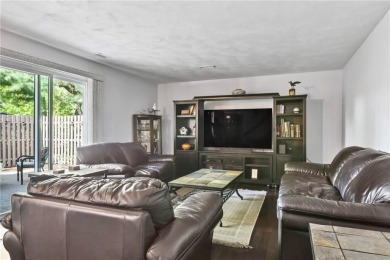 Discover this welcoming condo in the desirable Fairways Complex on Woodland Greens Golf Club in Rhode Island - for sale on GolfHomes.com, golf home, golf lot