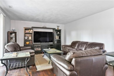 Discover this welcoming condo in the desirable Fairways Complex on Woodland Greens Golf Club in Rhode Island - for sale on GolfHomes.com, golf home, golf lot