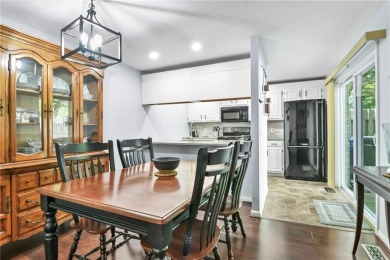 Discover this welcoming condo in the desirable Fairways Complex on Woodland Greens Golf Club in Rhode Island - for sale on GolfHomes.com, golf home, golf lot