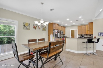 a beautifully maintained and thoughtfully upgraded 4-bedroom on Diamondhead Country Club in Mississippi - for sale on GolfHomes.com, golf home, golf lot