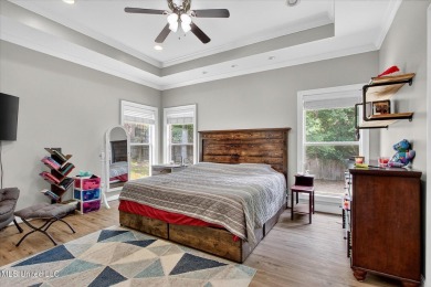 a beautifully maintained and thoughtfully upgraded 4-bedroom on Diamondhead Country Club in Mississippi - for sale on GolfHomes.com, golf home, golf lot