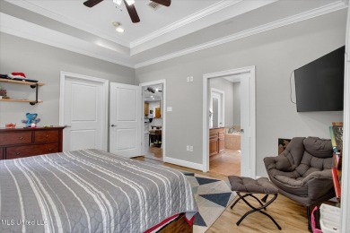 a beautifully maintained and thoughtfully upgraded 4-bedroom on Diamondhead Country Club in Mississippi - for sale on GolfHomes.com, golf home, golf lot