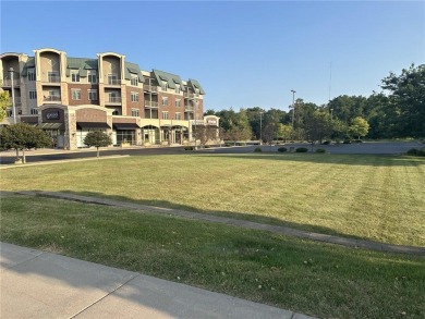 Welcome to your fabulous new home where every room has a view of on Eau Claire Golf and Country Club in Wisconsin - for sale on GolfHomes.com, golf home, golf lot