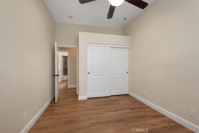 Beautifully appointed single-level home in the gated community on Cypress Ridge in California - for sale on GolfHomes.com, golf home, golf lot