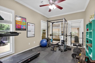 a beautifully maintained and thoughtfully upgraded 4-bedroom on Diamondhead Country Club in Mississippi - for sale on GolfHomes.com, golf home, golf lot