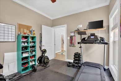 a beautifully maintained and thoughtfully upgraded 4-bedroom on Diamondhead Country Club in Mississippi - for sale on GolfHomes.com, golf home, golf lot