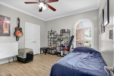 a beautifully maintained and thoughtfully upgraded 4-bedroom on Diamondhead Country Club in Mississippi - for sale on GolfHomes.com, golf home, golf lot