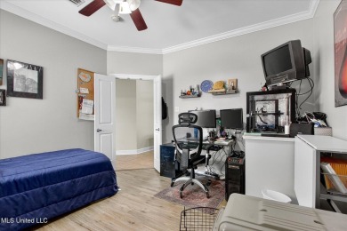 a beautifully maintained and thoughtfully upgraded 4-bedroom on Diamondhead Country Club in Mississippi - for sale on GolfHomes.com, golf home, golf lot