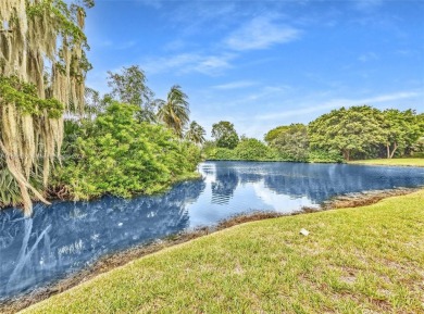 Spectacular 3-bed, 3-bath townhouse in Plantation with on Jacaranda Golf Club in Florida - for sale on GolfHomes.com, golf home, golf lot