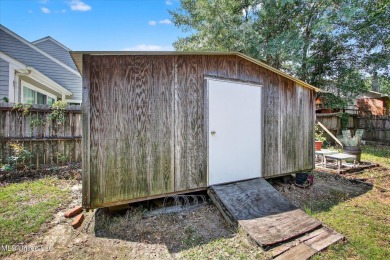 a beautifully maintained and thoughtfully upgraded 4-bedroom on Diamondhead Country Club in Mississippi - for sale on GolfHomes.com, golf home, golf lot