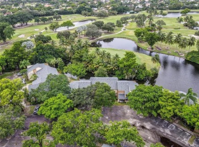 Spectacular 3-bed, 3-bath townhouse in Plantation with on Jacaranda Golf Club in Florida - for sale on GolfHomes.com, golf home, golf lot