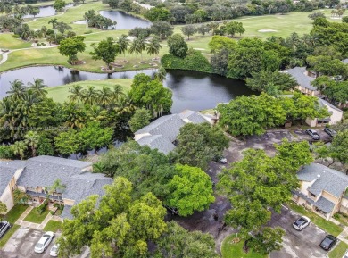 Spectacular 3-bed, 3-bath townhouse in Plantation with on Jacaranda Golf Club in Florida - for sale on GolfHomes.com, golf home, golf lot