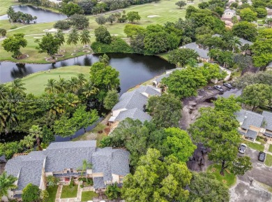 Spectacular 3-bed, 3-bath townhouse in Plantation with on Jacaranda Golf Club in Florida - for sale on GolfHomes.com, golf home, golf lot