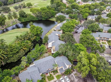 Spectacular 3-bed, 3-bath townhouse in Plantation with on Jacaranda Golf Club in Florida - for sale on GolfHomes.com, golf home, golf lot