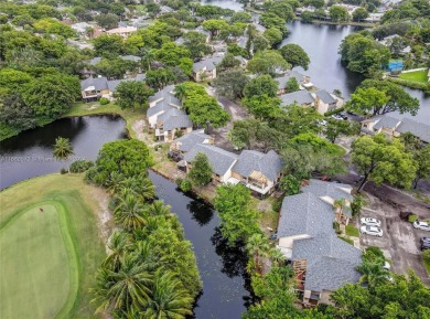 Spectacular 3-bed, 3-bath townhouse in Plantation with on Jacaranda Golf Club in Florida - for sale on GolfHomes.com, golf home, golf lot