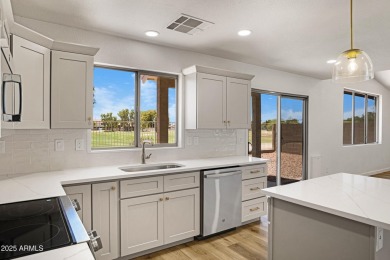 This beautifully updated home invites you in with a renewed on Western Skies Golf Club in Arizona - for sale on GolfHomes.com, golf home, golf lot