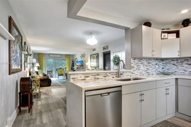 Welcome to this beautifully updated 2-bedroom, 2-bathroom condo on Wynmoor Golf Course in Florida - for sale on GolfHomes.com, golf home, golf lot