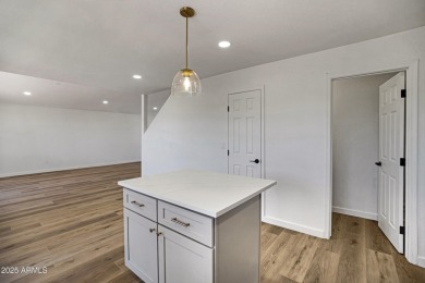 This beautifully updated home invites you in with a renewed on Western Skies Golf Club in Arizona - for sale on GolfHomes.com, golf home, golf lot