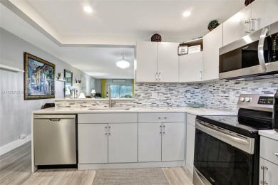 Welcome to this beautifully updated 2-bedroom, 2-bathroom condo on Wynmoor Golf Course in Florida - for sale on GolfHomes.com, golf home, golf lot