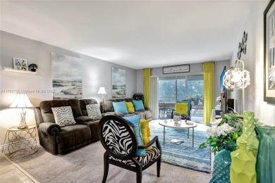 Welcome to this beautifully updated 2-bedroom, 2-bathroom condo on Wynmoor Golf Course in Florida - for sale on GolfHomes.com, golf home, golf lot