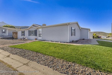 Home sweet home!! This well loved and well maintained home is on Battlement Mesa Golf Course in Colorado - for sale on GolfHomes.com, golf home, golf lot