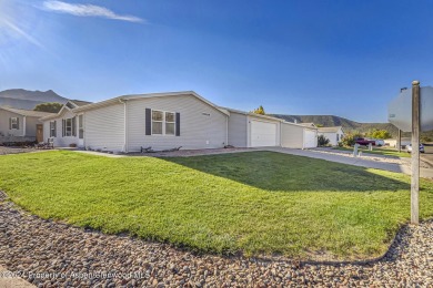 Home sweet home!! This well loved and well maintained home is on Battlement Mesa Golf Course in Colorado - for sale on GolfHomes.com, golf home, golf lot