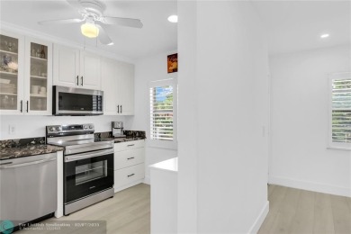 FURNISHED LAKEFRONT CORNER UNIT CONDO in the desirable Cypresses on Boca Lago Golf and Country Club in Florida - for sale on GolfHomes.com, golf home, golf lot