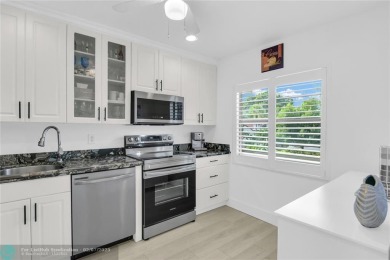 FURNISHED LAKEFRONT CORNER UNIT CONDO in the desirable Cypresses on Boca Lago Golf and Country Club in Florida - for sale on GolfHomes.com, golf home, golf lot