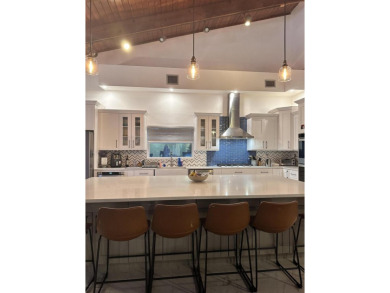 This beautiful modern home has lots of upgrades. It's a true on Ocean Breeze Golf and Country Club in Florida - for sale on GolfHomes.com, golf home, golf lot