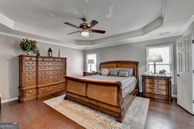 Perfectly positioned on the 8th green in highly desirable on Hampton Golf Village in Georgia - for sale on GolfHomes.com, golf home, golf lot