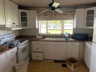Palm Hill Country Club is a premier 55+ manufactured home on Palm Hill Golf Club in Florida - for sale on GolfHomes.com, golf home, golf lot