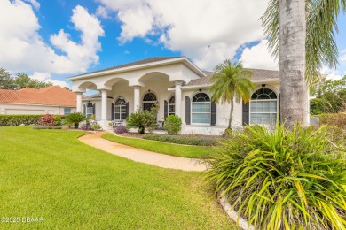 Step into refined living with this spacious executive retreat on Spruce Creek Golf Club in Florida - for sale on GolfHomes.com, golf home, golf lot