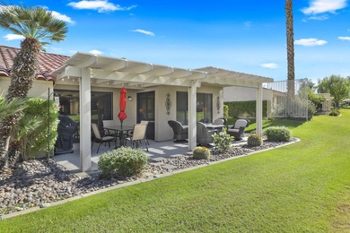 This beautifully updated 2-bedroom, 2-bath condo in the heart of on Palm Desert Resort Country Club in California - for sale on GolfHomes.com, golf home, golf lot