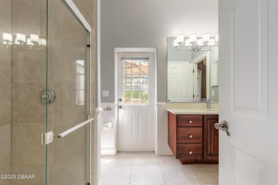 Step into refined living with this spacious executive retreat on Spruce Creek Golf Club in Florida - for sale on GolfHomes.com, golf home, golf lot