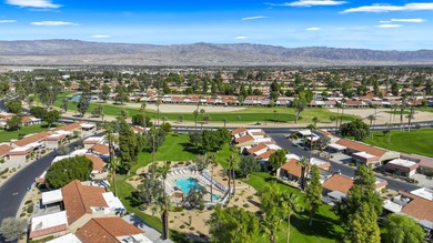 This beautifully updated 2-bedroom, 2-bath condo in the heart of on Palm Desert Resort Country Club in California - for sale on GolfHomes.com, golf home, golf lot