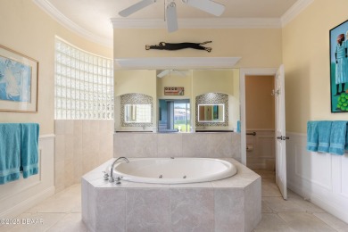 Step into refined living with this spacious executive retreat on Spruce Creek Golf Club in Florida - for sale on GolfHomes.com, golf home, golf lot