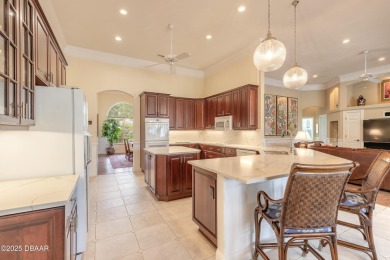 Step into refined living with this spacious executive retreat on Spruce Creek Golf Club in Florida - for sale on GolfHomes.com, golf home, golf lot