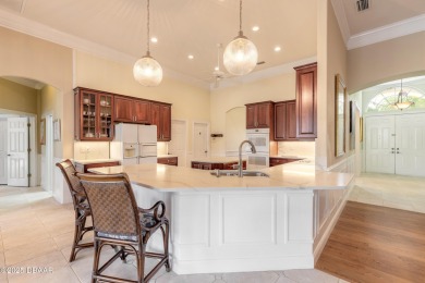 Step into refined living with this spacious executive retreat on Spruce Creek Golf Club in Florida - for sale on GolfHomes.com, golf home, golf lot