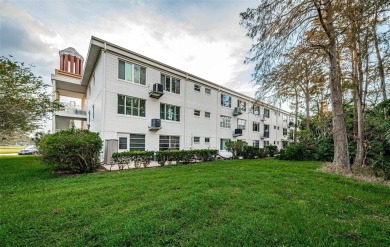 Welcome to this newly improved 2-bedroom, 2-bathroom end unit on On Top Of The World Golf Course in Florida - for sale on GolfHomes.com, golf home, golf lot