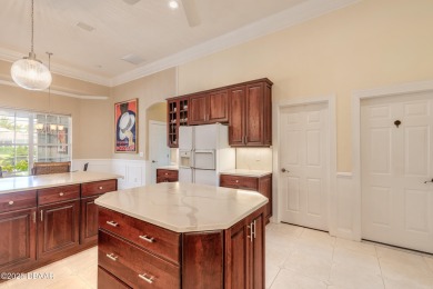 Step into refined living with this spacious executive retreat on Spruce Creek Golf Club in Florida - for sale on GolfHomes.com, golf home, golf lot