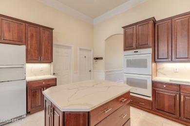 Step into refined living with this spacious executive retreat on Spruce Creek Golf Club in Florida - for sale on GolfHomes.com, golf home, golf lot