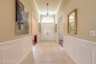 Step into refined living with this spacious executive retreat on Spruce Creek Golf Club in Florida - for sale on GolfHomes.com, golf home, golf lot
