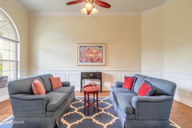 Step into refined living with this spacious executive retreat on Spruce Creek Golf Club in Florida - for sale on GolfHomes.com, golf home, golf lot