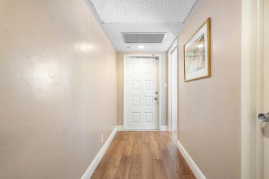 Spacious 3-Bedroom Condo with Stunning Lake, Garden, and Golf on Palm-Aire Country Club and Resort - The Oaks in Florida - for sale on GolfHomes.com, golf home, golf lot