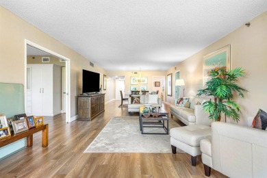 Spacious 3-Bedroom Condo with Stunning Lake, Garden, and Golf on Palm-Aire Country Club and Resort - The Oaks in Florida - for sale on GolfHomes.com, golf home, golf lot