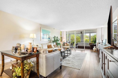 Spacious 3-Bedroom Condo with Stunning Lake, Garden, and Golf on Palm-Aire Country Club and Resort - The Oaks in Florida - for sale on GolfHomes.com, golf home, golf lot