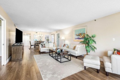 Spacious 3-Bedroom Condo with Stunning Lake, Garden, and Golf on Palm-Aire Country Club and Resort - The Oaks in Florida - for sale on GolfHomes.com, golf home, golf lot