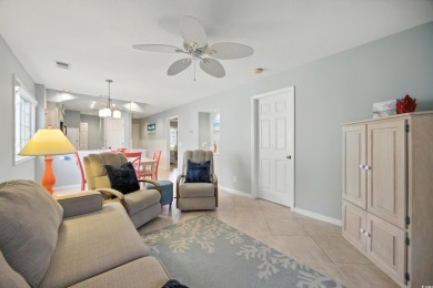 Discover your perfect coastal escape in this wonderful, fully on Surf Golf and Beach Club in South Carolina - for sale on GolfHomes.com, golf home, golf lot