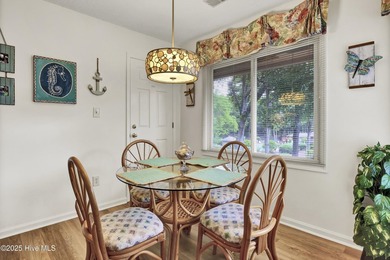 Nestled in the heart of Sunset Beach, this beautifully furnished on Oyster Bay Golf Links in North Carolina - for sale on GolfHomes.com, golf home, golf lot